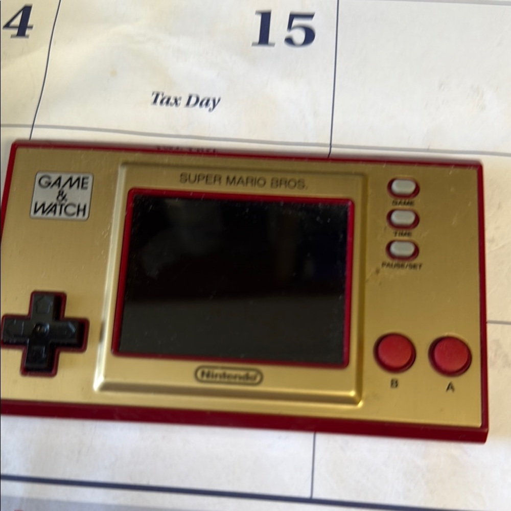Nintendo Red and Gold Handheld Console Super Mario Edition
